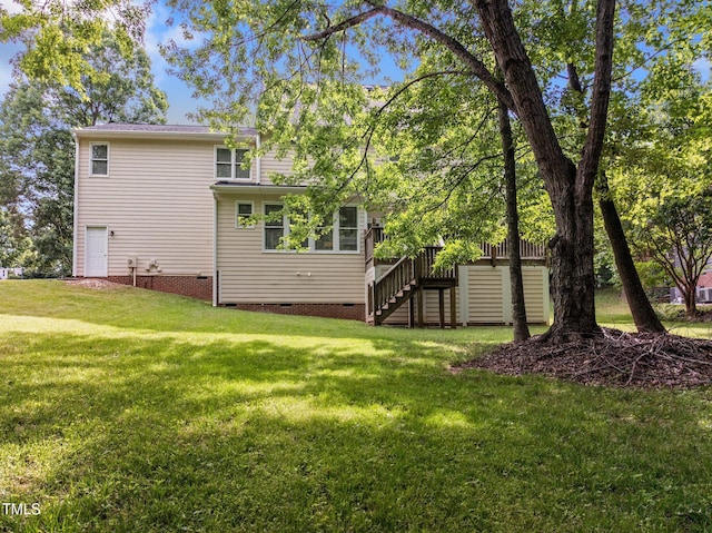 100 Silver Lining Ln, Cary, NC 27513 - rear view of house featuring crawl space, stairway, and a lawn