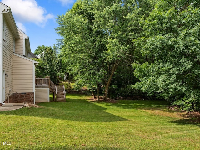 100 Silver Lining Ln, Cary, NC 27513 - view of grassy yard with stairway and a deck