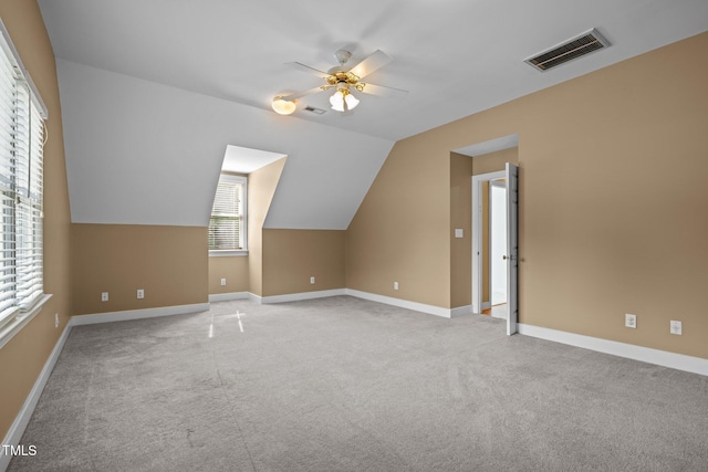 100 Silver Lining Ln, Cary, NC 27513 - additional living space with ceiling fan, carpet floors, vaulted ceiling, and baseboards