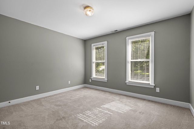 100 Silver Lining Ln, Cary, NC 27513 - carpeted spare room with baseboards
