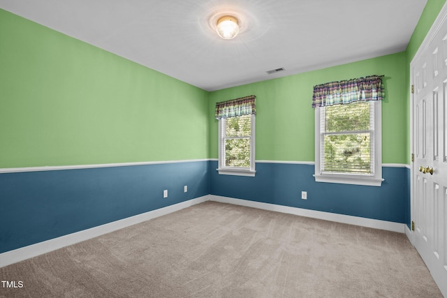100 Silver Lining Ln, Cary, NC 27513 - carpeted empty room with baseboards
