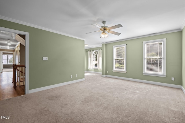100 Silver Lining Ln, Cary, NC 27513 - carpeted spare room featuring crown molding, baseboards, and ceiling fan