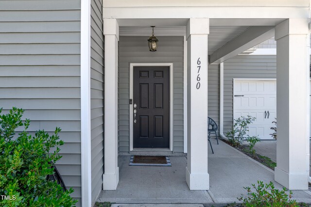 6760 Longitude Cir, Sims, NC 27880 - doorway to property with covered porch