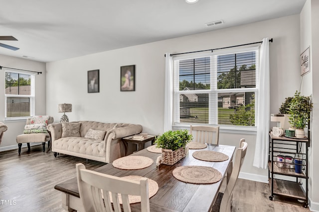 6760 Longitude Cir, Sims, NC 27880 - dining space with baseboards, wood finished floors, and a ceiling fan