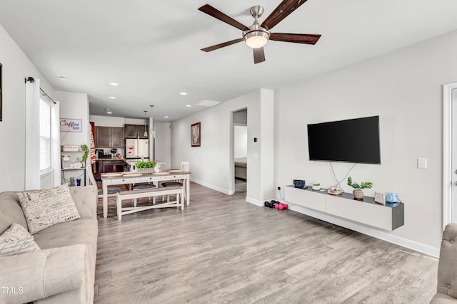 6760 Longitude Cir, Sims, NC 27880 - living room with ceiling fan, light wood finished floors, baseboards, and recessed lighting