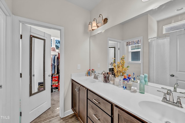 6760 Longitude Cir, Sims, NC 27880 - bathroom featuring double vanity and healthy amount of natural light