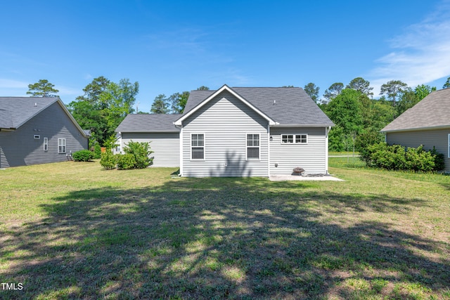 6760 Longitude Cir, Sims, NC 27880 - back of house with a yard