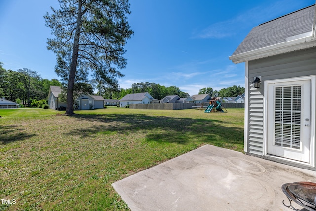 6760 Longitude Cir, Sims, NC 27880 - view of yard featuring a patio, a playground, and a residential view
