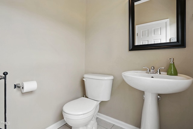 4907 Wyatt Brook Way, Raleigh, NC 27609 - bathroom featuring toilet, tile patterned flooring, and baseboards