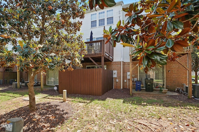 4907 Wyatt Brook Way, Raleigh, NC 27609 - rear view of property featuring brick siding and cooling unit