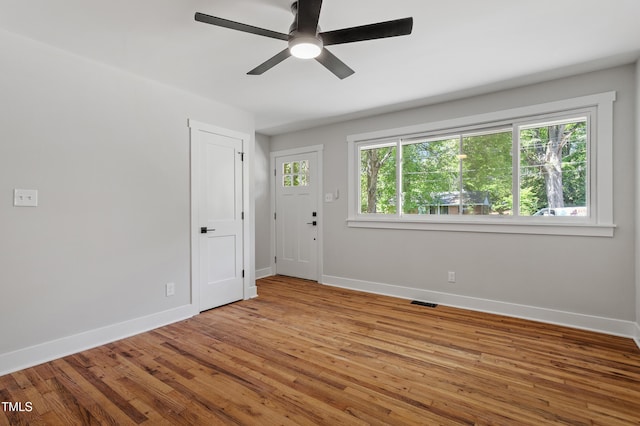 833 Brigham Rd, Raleigh, NC 27610 - unfurnished room with baseboards, ceiling fan, and wood finished floors