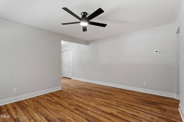833 Brigham Rd, Raleigh, NC 27610 - empty room with a ceiling fan, light wood-style floors, and baseboards