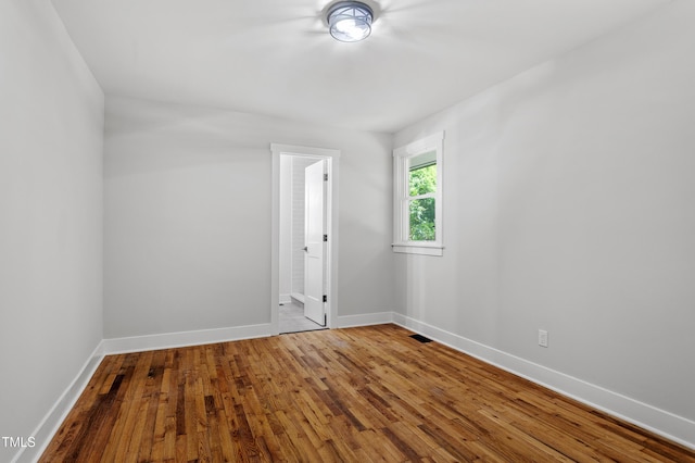 833 Brigham Rd, Raleigh, NC 27610 - empty room featuring baseboards and hardwood / wood-style floors