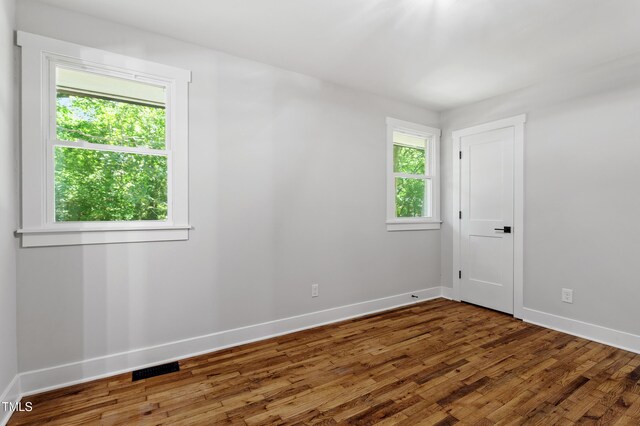 833 Brigham Rd, Raleigh, NC 27610 - empty room featuring baseboards and wood finished floors