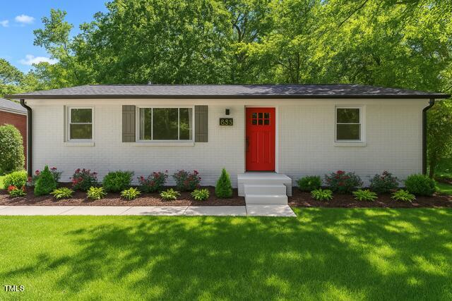 833 Brigham Rd, Raleigh, NC 27610 - ranch-style home featuring a front yard and brick siding