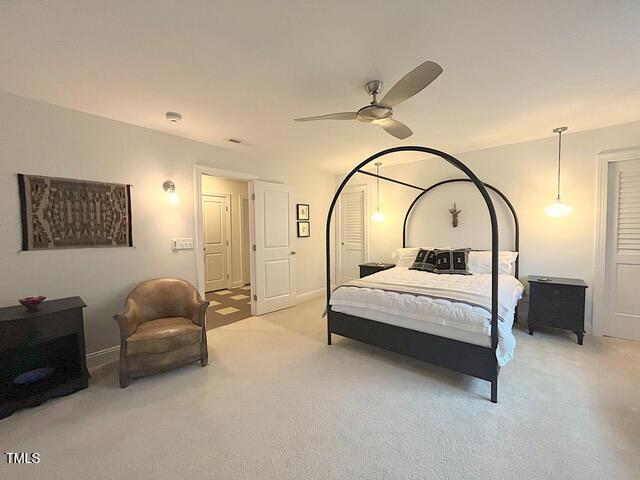 59 Tobacco Farm Way, Chapel Hill, NC 27516 - bedroom featuring light carpet and a ceiling fan