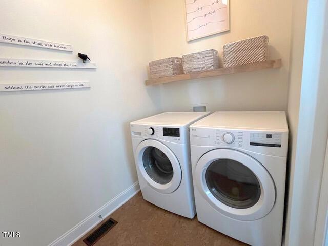 59 Tobacco Farm Way, Chapel Hill, NC 27516 - washroom with washer and dryer and baseboards
