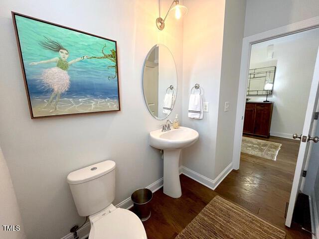 59 Tobacco Farm Way, Chapel Hill, NC 27516 - half bath featuring wood finished floors and baseboards
