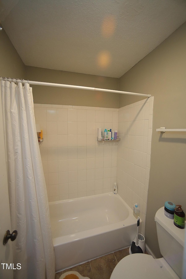 1910 Trexler Ct, Raleigh, NC 27606 - full bathroom with toilet, tile patterned flooring, and shower / tub combo
