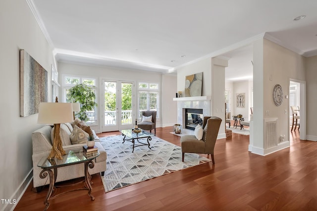 81002 Alexander, Chapel Hill, NC 27517 - living room featuring crown molding, wood finished floors, a fireplace, and recessed lighting