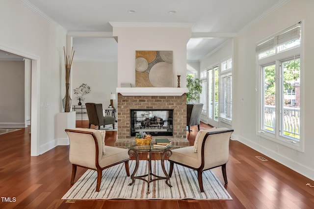 81002 Alexander, Chapel Hill, NC 27517 - living area with wood finished floors, crown molding, and a fireplace