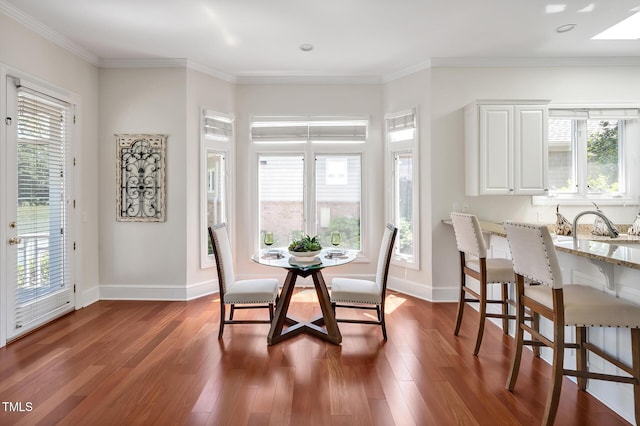 81002 Alexander, Chapel Hill, NC 27517 - dining space with plenty of natural light, dark wood-style flooring, and crown molding