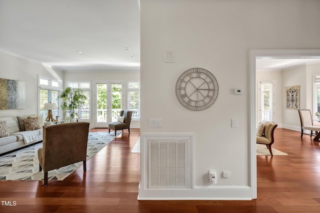 81002 Alexander, Chapel Hill, NC 27517 - living room featuring ornamental molding, wood finished floors, and recessed lighting