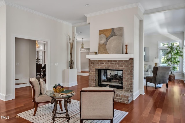 81002 Alexander, Chapel Hill, NC 27517 - living room with wood finished floors, crown molding, and a brick fireplace
