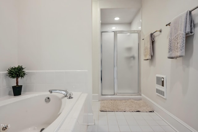 81002 Alexander, Chapel Hill, NC 27517 - bathroom with heating unit, a shower stall, a garden tub, and tile patterned flooring