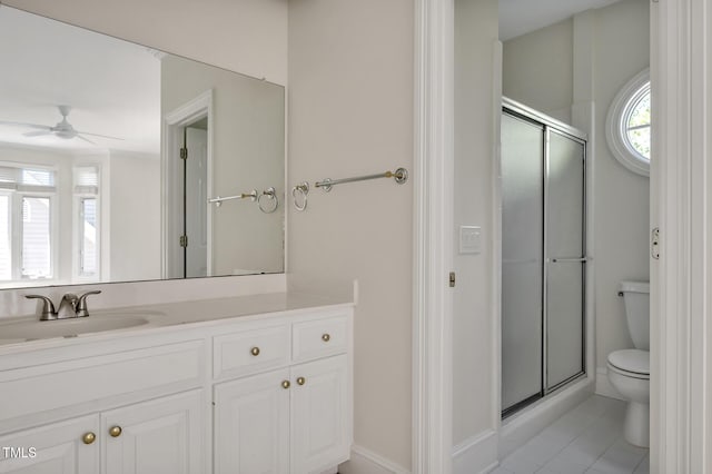 81002 Alexander, Chapel Hill, NC 27517 - bathroom with a ceiling fan, a shower stall, vanity, and tile patterned floors