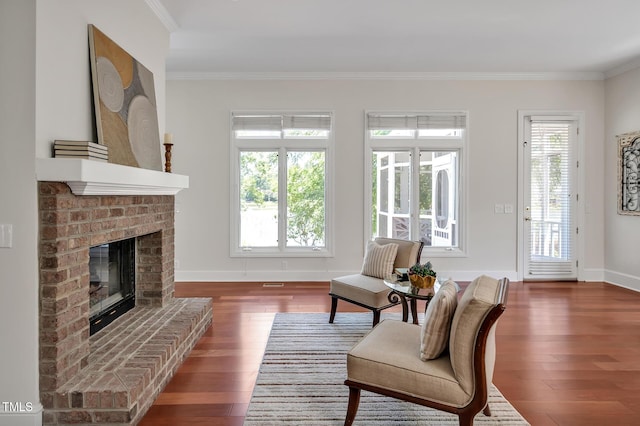 81002 Alexander, Chapel Hill, NC 27517 - living room with ornamental molding, wood finished floors, and a fireplace