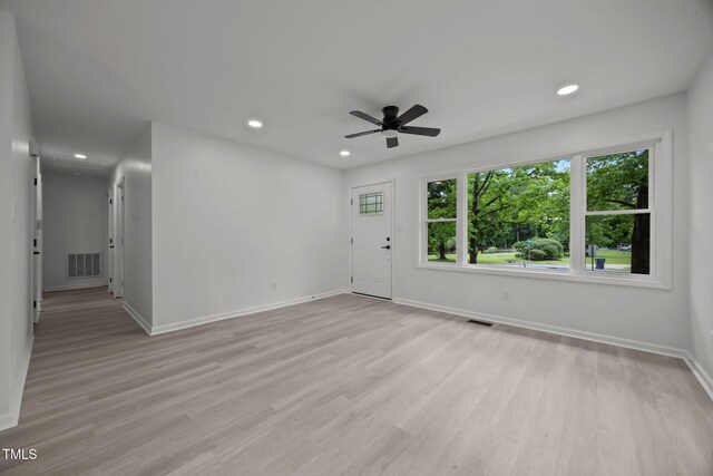111 S Gaylee Lake Dr, Wendell, NC 27591 - unfurnished living room with a ceiling fan, baseboards, light wood-type flooring, and recessed lighting