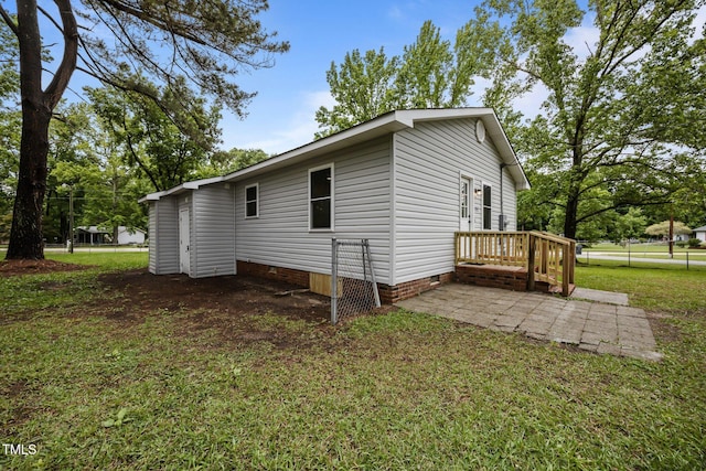 111 S Gaylee Lake Dr, Wendell, NC 27591 - view of side of home featuring crawl space, a lawn, and a patio area