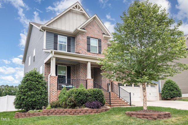 1716 Longmont Dr, Wake Forest, NC 27587 - craftsman house with board and batten siding, driveway, covered porch, brick siding, and a garage