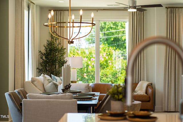 1408 Sawyer Rd Unit 103, Raleigh, NC 27610 - living room with a chandelier, plenty of natural light, and ceiling fan