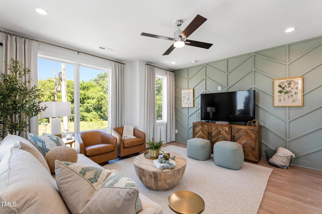 1408 Sawyer Rd Unit 103, Raleigh, NC 27610 - living area with a decorative wall, wood finished floors, ceiling fan, and recessed lighting