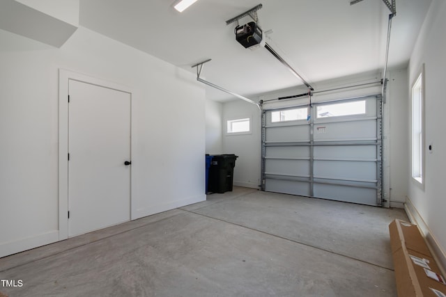 1408 Sawyer Rd Unit 103, Raleigh, NC 27610 - garage featuring a garage door opener