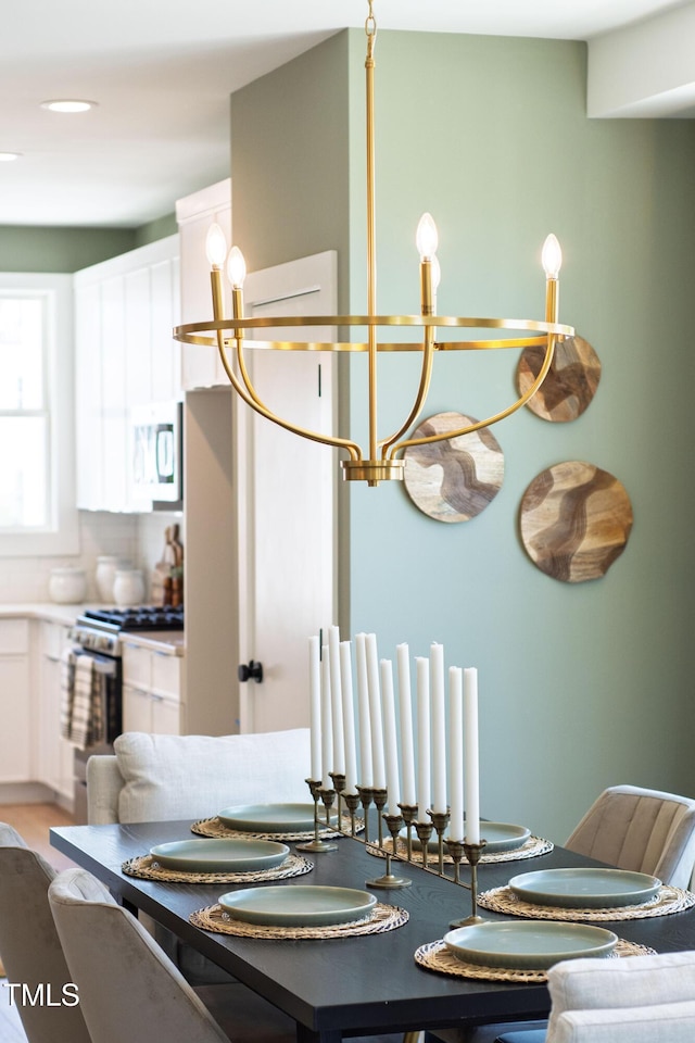 1408 Sawyer Rd Unit 103, Raleigh, NC 27610 - dining space with a chandelier