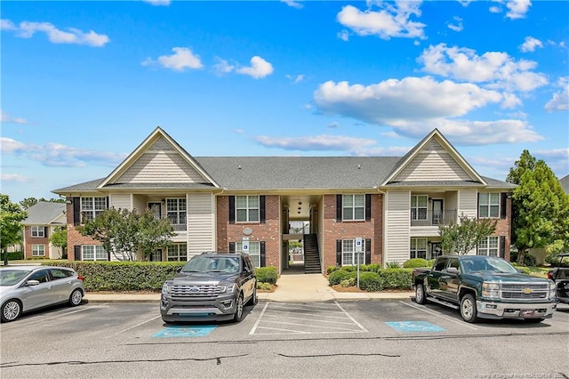 159 Gallery Dr Unit 103, Spring Lake, NC 28390 - view of building exterior with uncovered parking