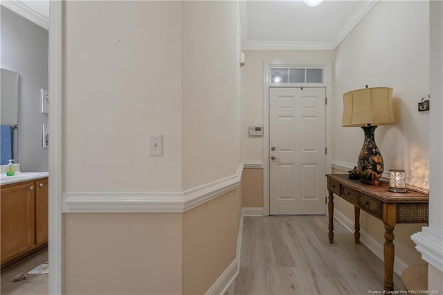 159 Gallery Dr Unit 103, Spring Lake, NC 28390 - foyer entrance with light wood-style flooring, ornamental molding, and baseboards