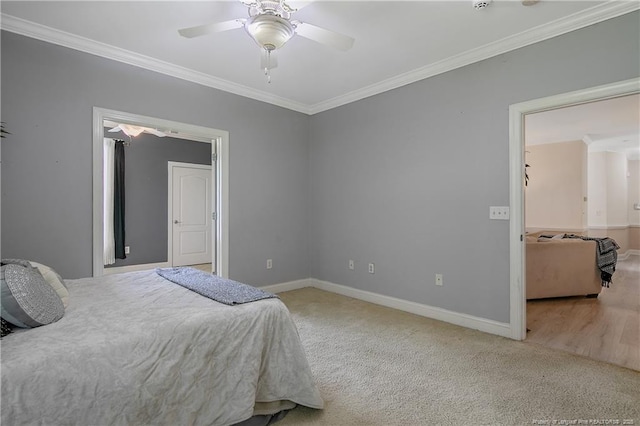 159 Gallery Dr Unit 103, Spring Lake, NC 28390 - bedroom with crown molding, baseboards, carpet flooring, and a ceiling fan
