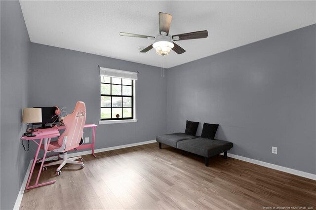 3855 Sturbridge Dr, Hope Mills, NC 28348 - office space with wood finished floors, baseboards, and ceiling fan