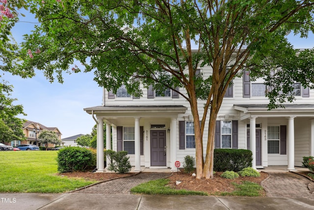 3141 Rapid Falls Rd, Cary, NC 27519 - view of front of home featuring a porch and a front lawn
