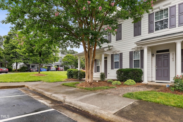 3141 Rapid Falls Rd, Cary, NC 27519 - view of front of home featuring uncovered parking and a front yard