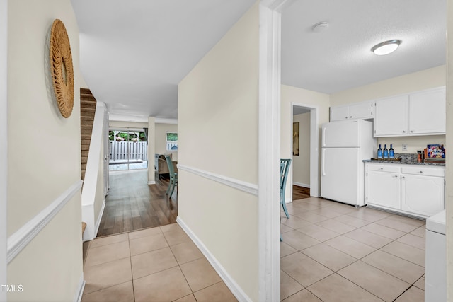 1220 Manassas Ct Unit B, Raleigh, NC 27609 - corridor featuring light tile patterned floors and baseboards