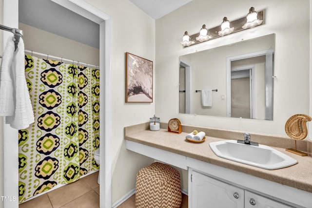 1220 Manassas Ct Unit B, Raleigh, NC 27609 - full bath with vanity, toilet, tile patterned flooring, and curtained shower