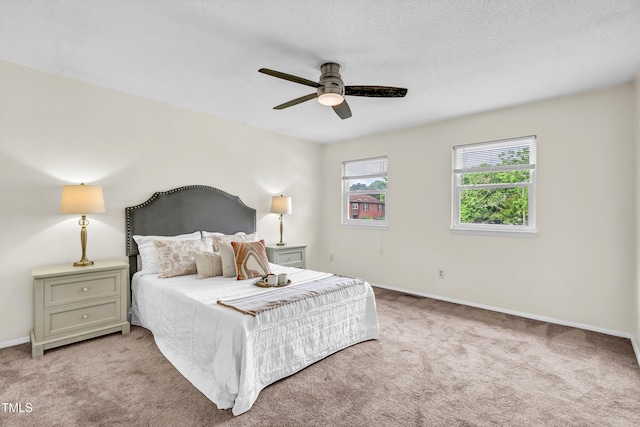 1220 Manassas Ct Unit B, Raleigh, NC 27609 - bedroom featuring carpet floors, baseboards, and a ceiling fan
