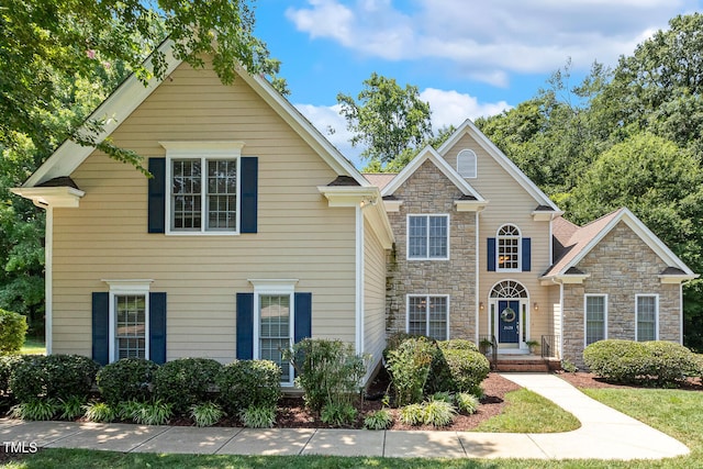 2628 Hunters Meadow Ln, Raleigh, NC 27606 - view of front of house featuring stone siding