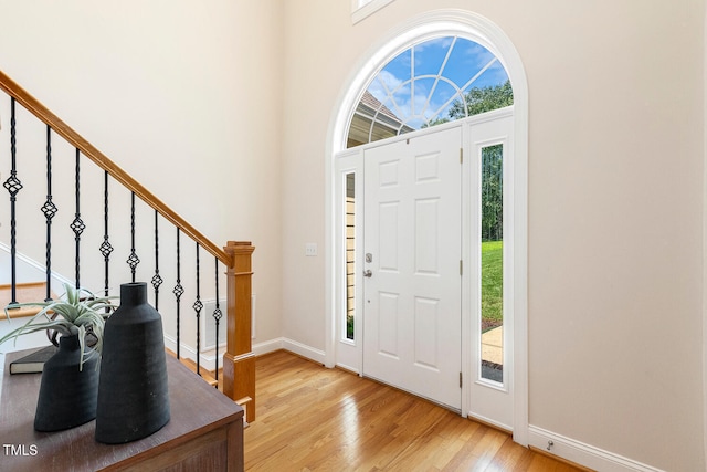 2628 Hunters Meadow Ln, Raleigh, NC 27606 - foyer featuring light wood-style flooring and stairway