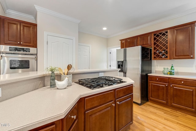 2628 Hunters Meadow Ln, Raleigh, NC 27606 - kitchen with appliances with stainless steel finishes, light countertops, light wood-type flooring, ornamental molding, and recessed lighting